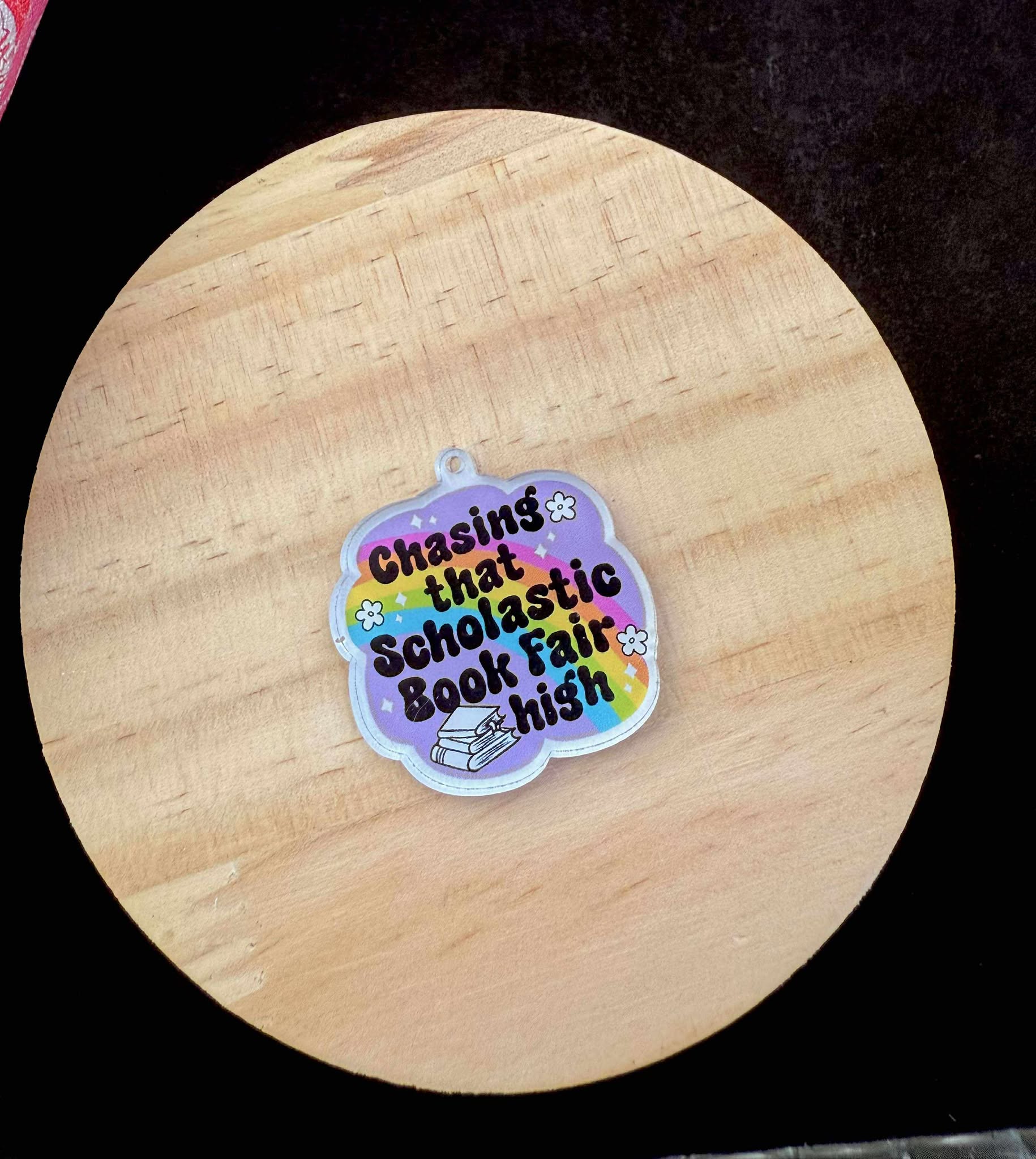 “Chasing That Scholastic Book Fair High” Dust Plug Charm – With Keyring & Clasp (iPhone, USB-C, Micro USB)