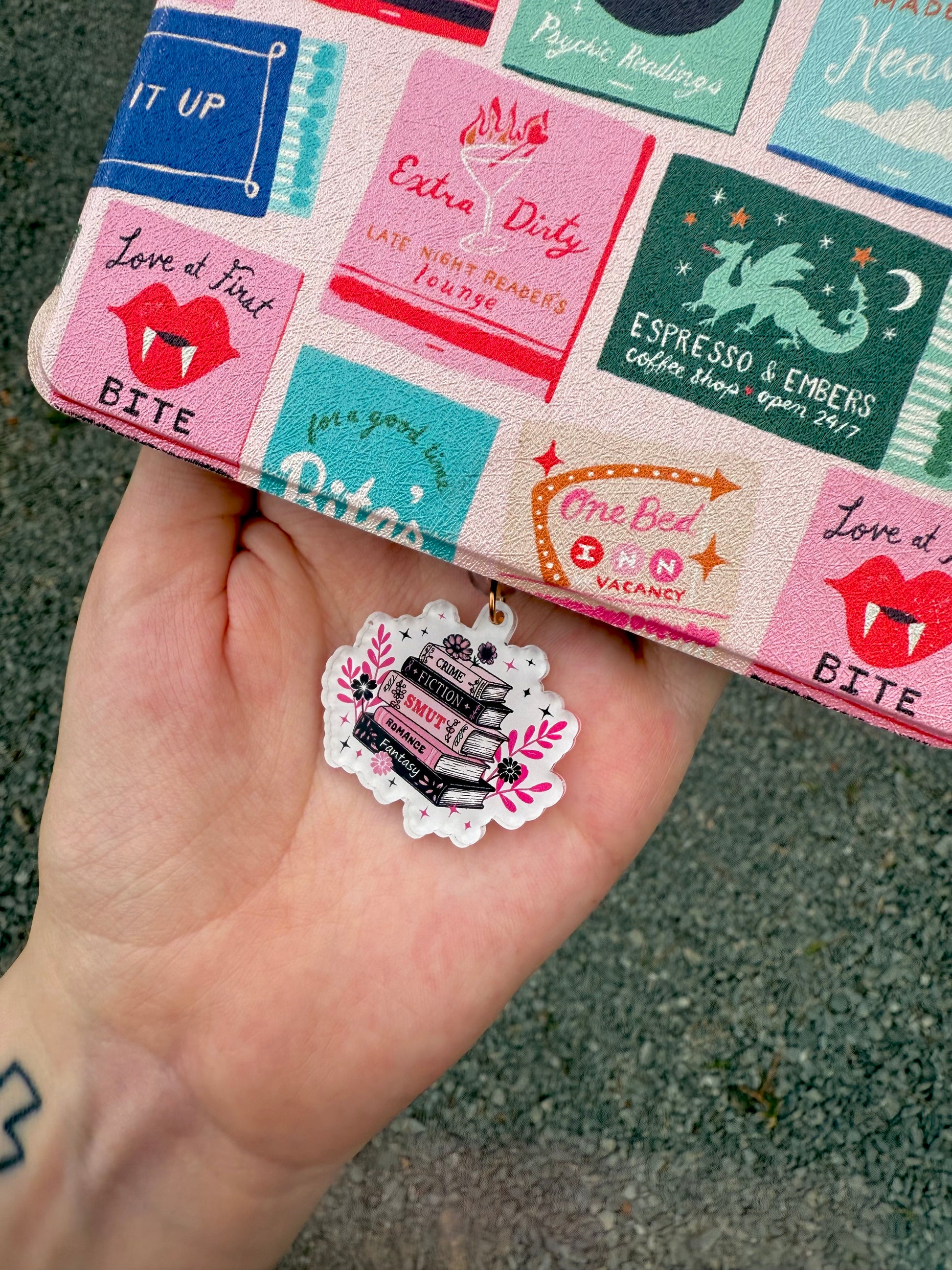 Stacked Book Genres Kindle Charm Dust Plug – Smut, Romance, Fantasy & More